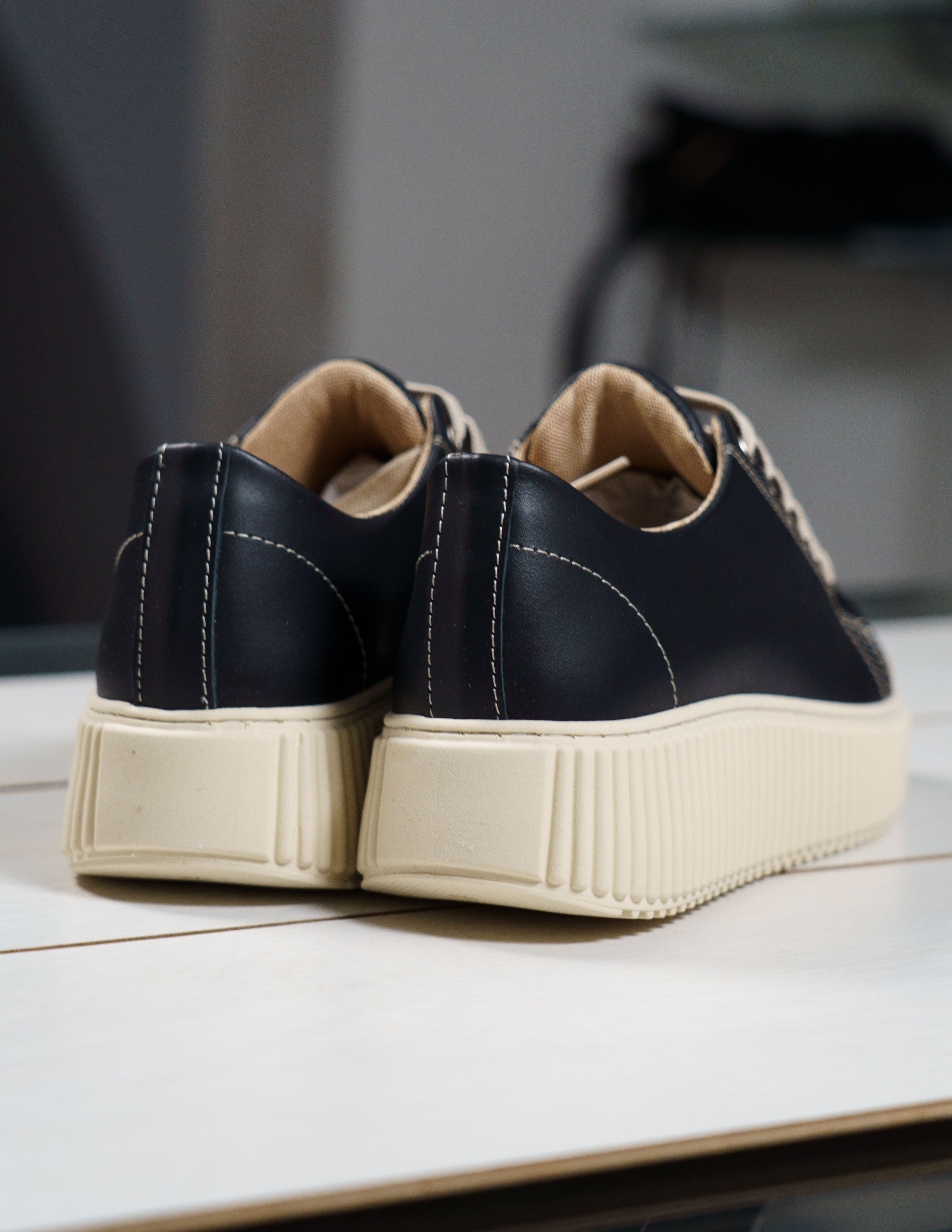 sneakers in pelle con fondo alto