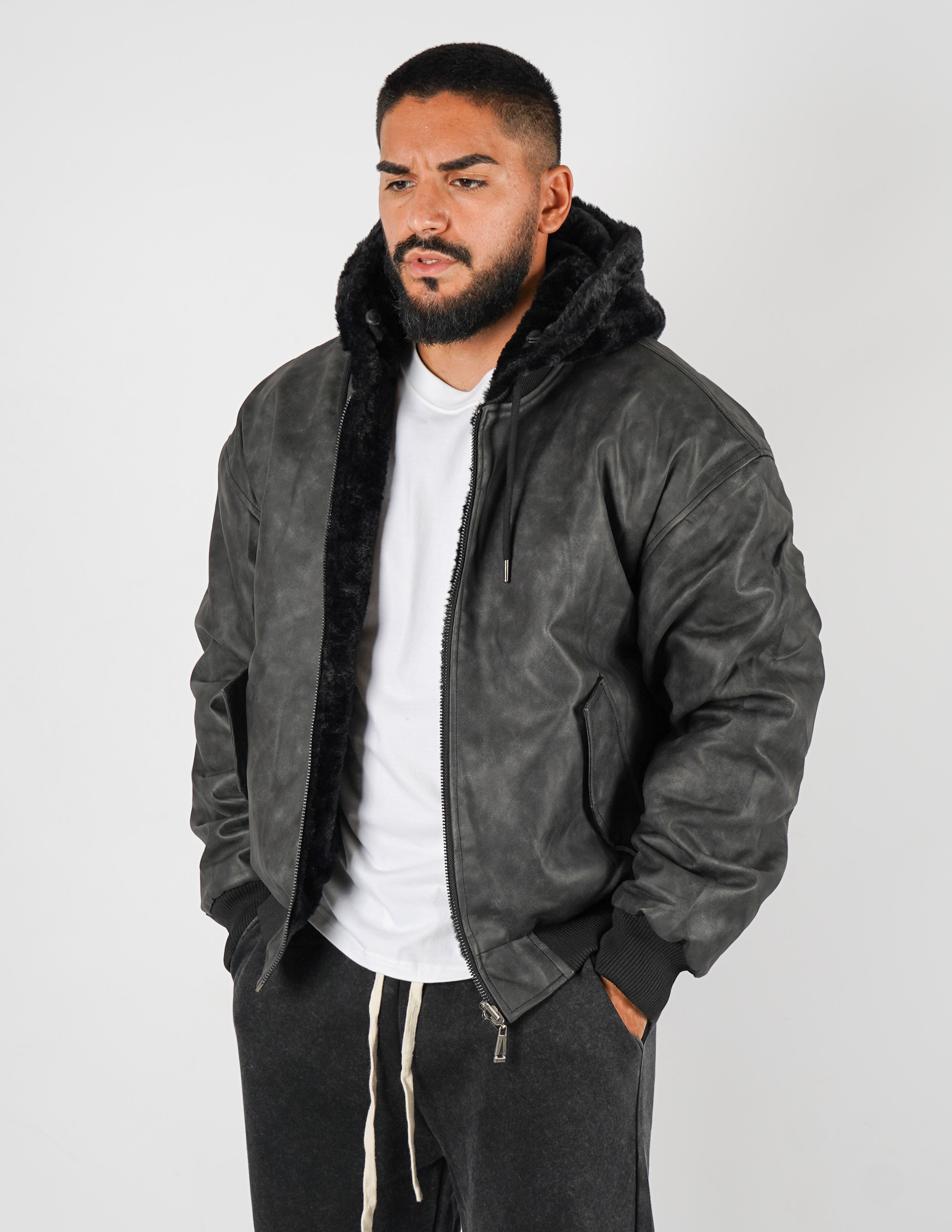 Pelliccia uomo reversibile con cappuccio