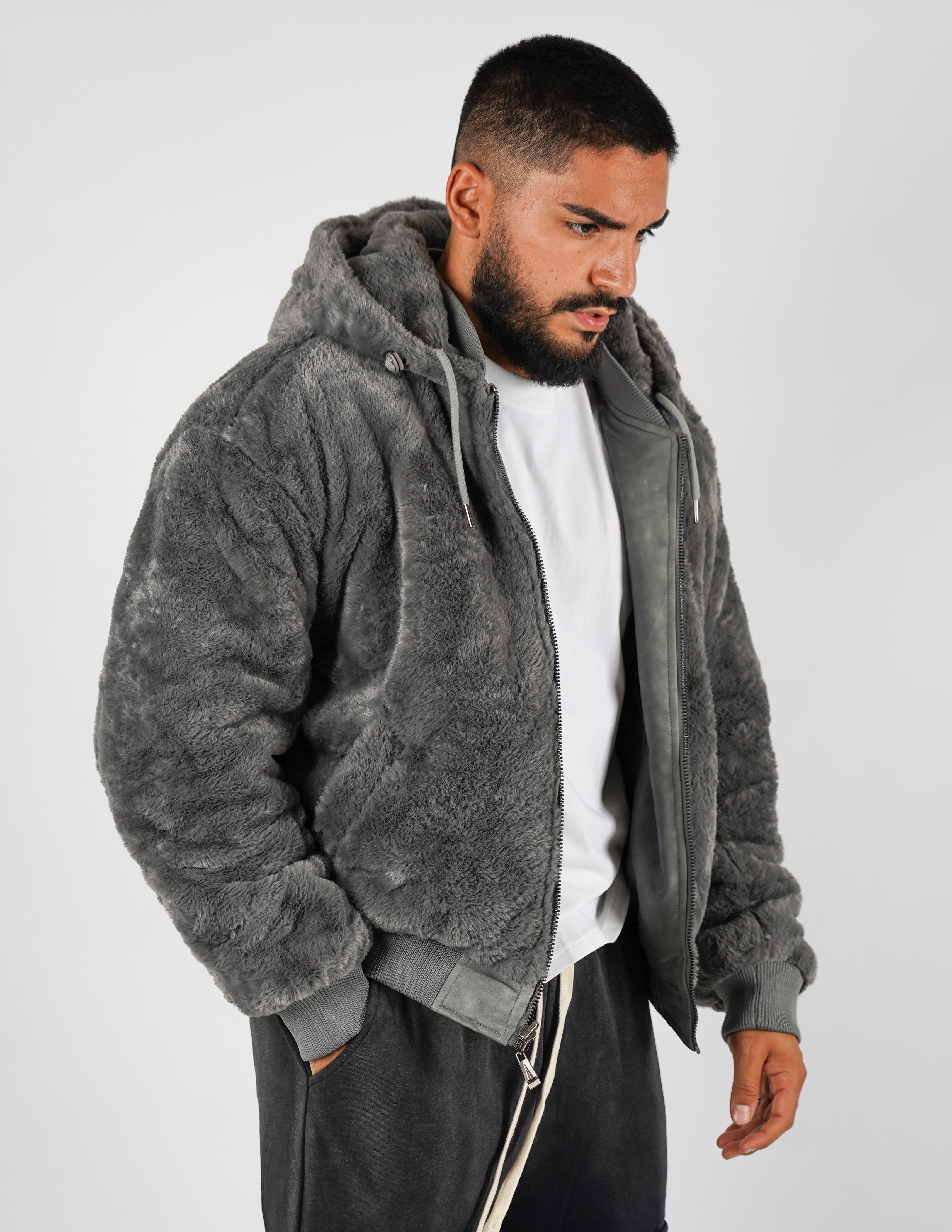 Pelliccia uomo reversibile con cappuccio
