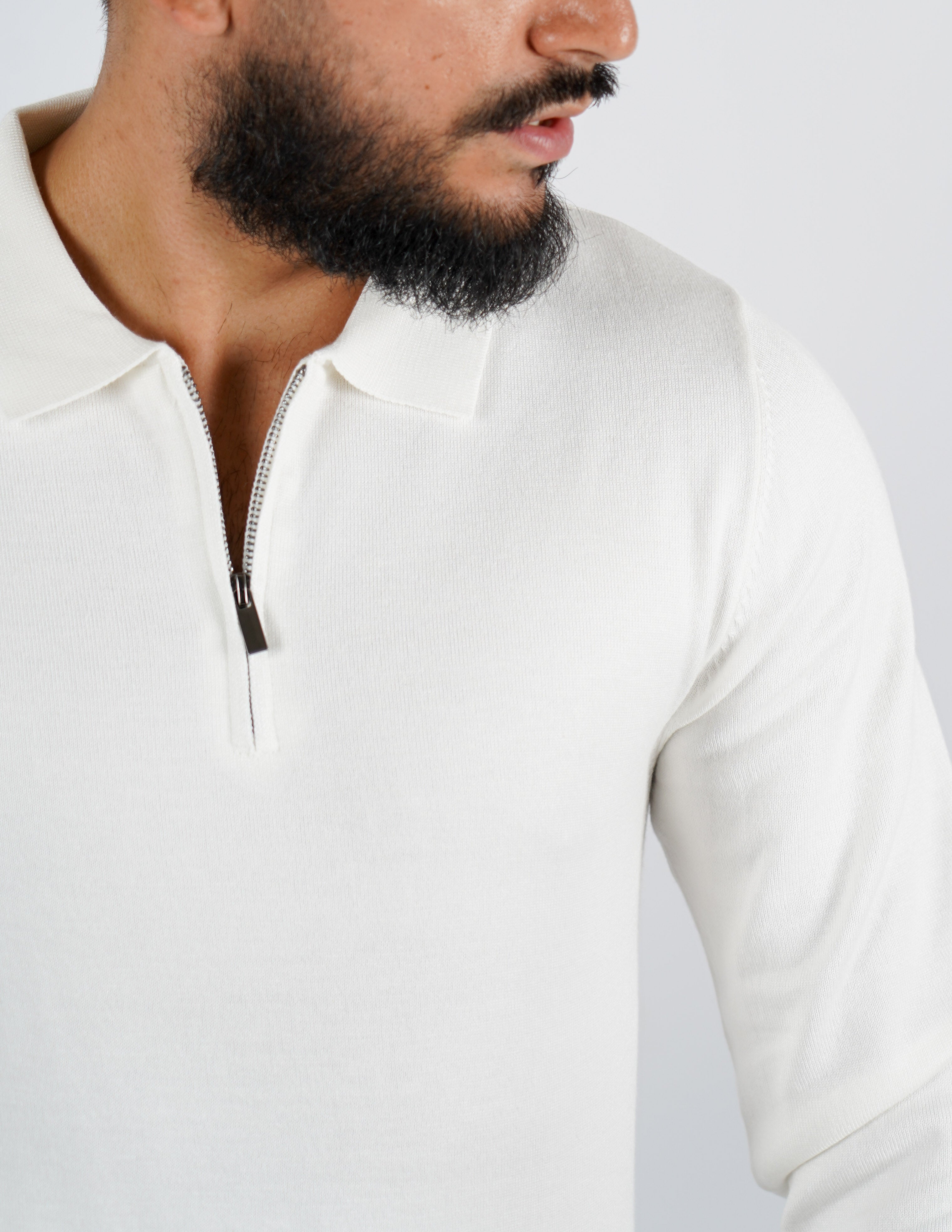 Polo tinta unita con zip