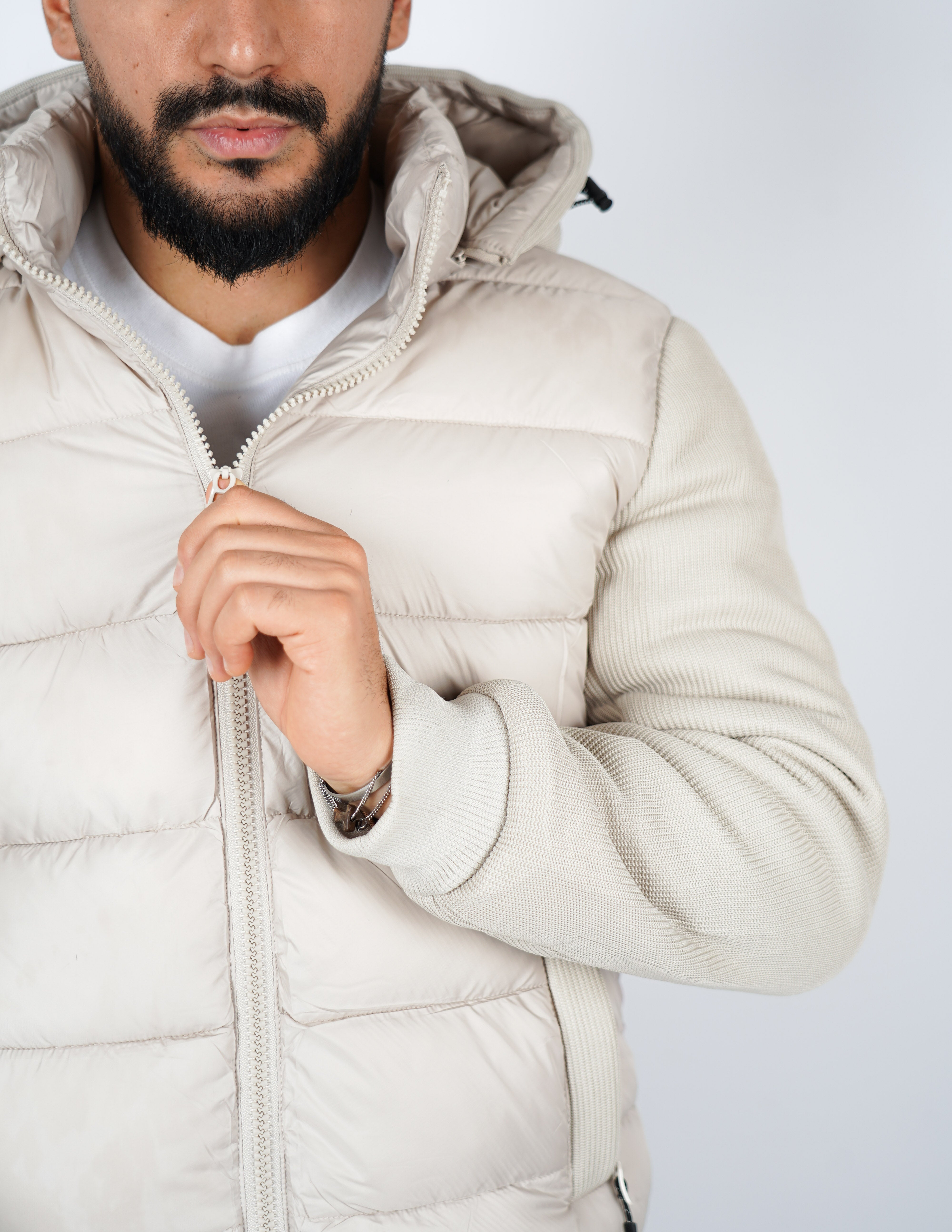 Giubbino imbottito con maniche in maglia