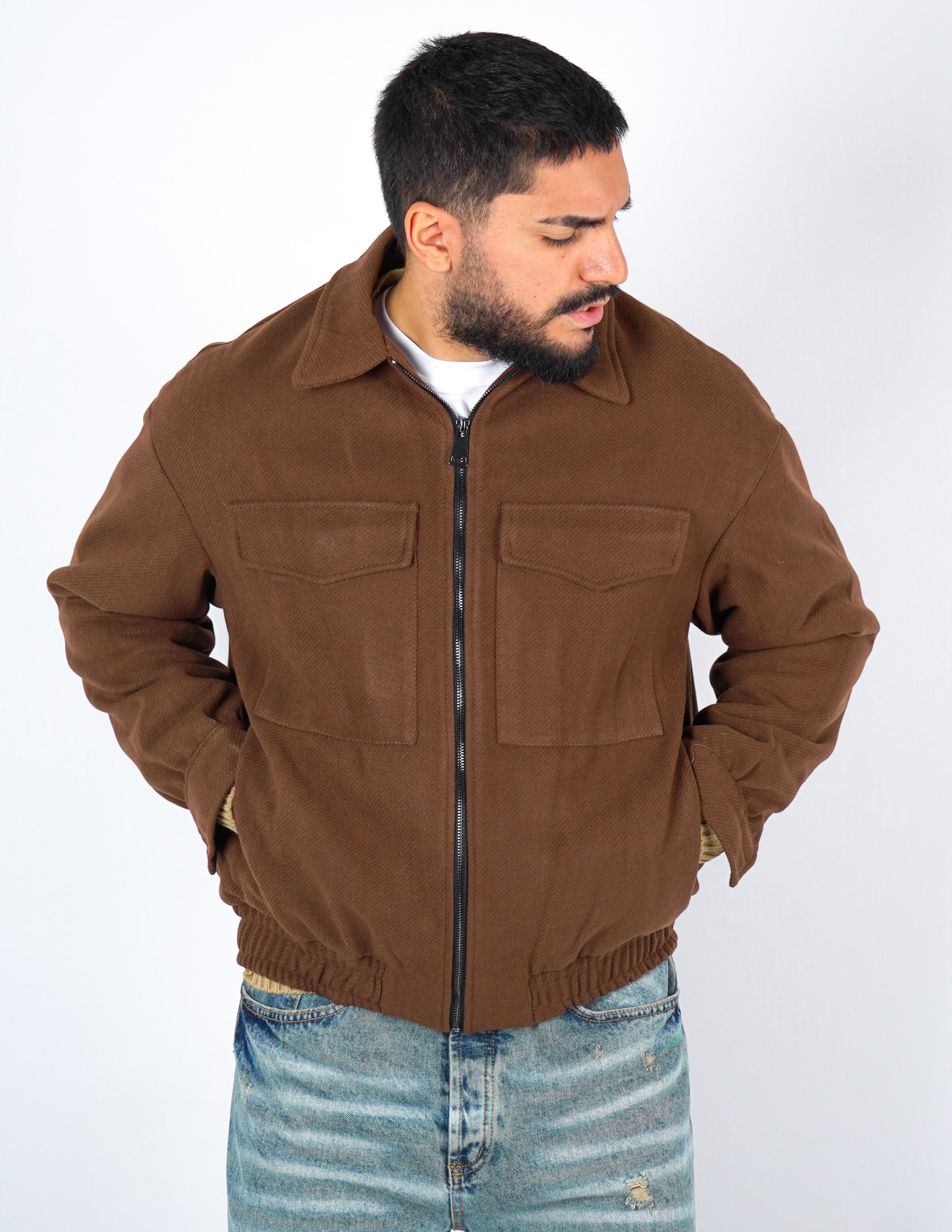 cappottino corto con tasche anteriori