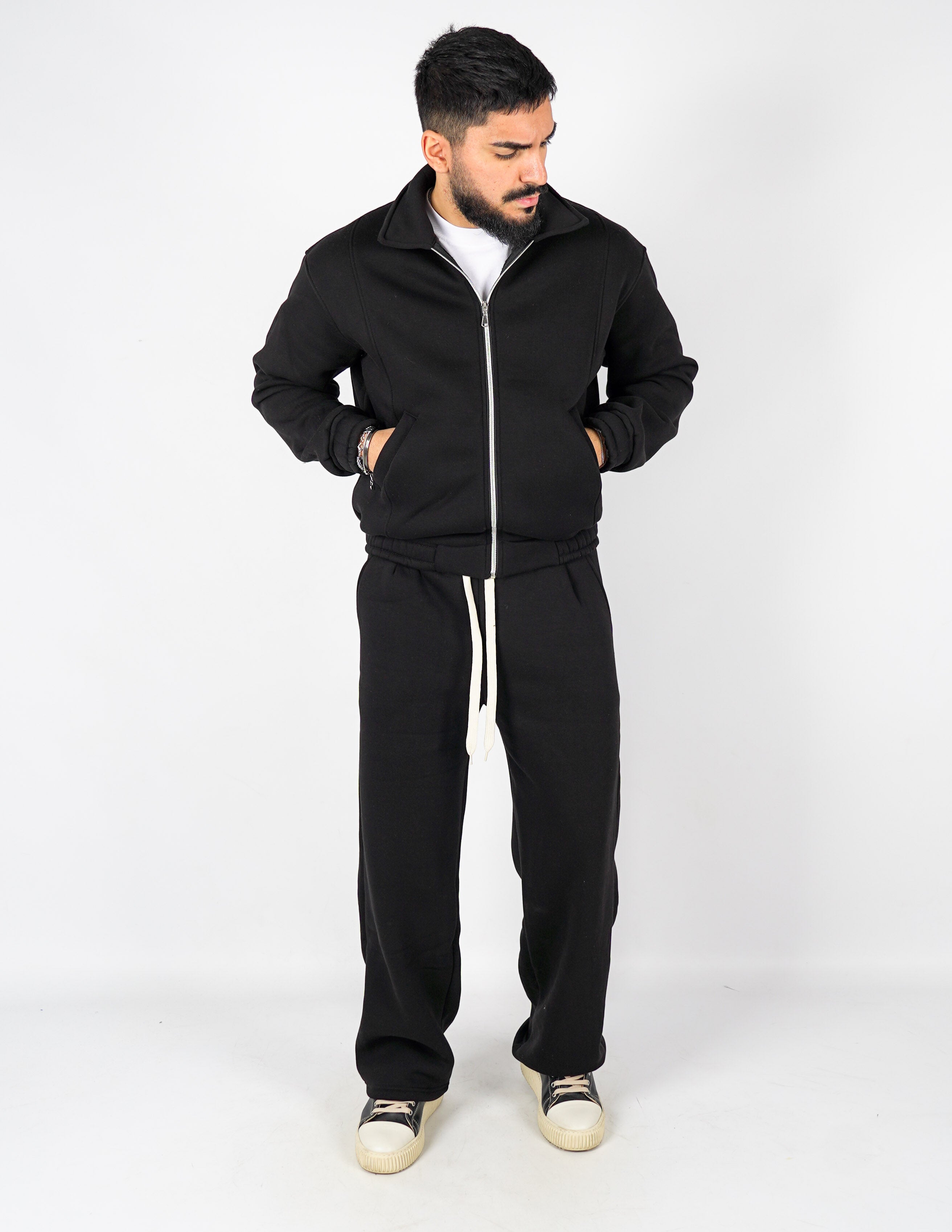 Tuta baggy con collo e zip