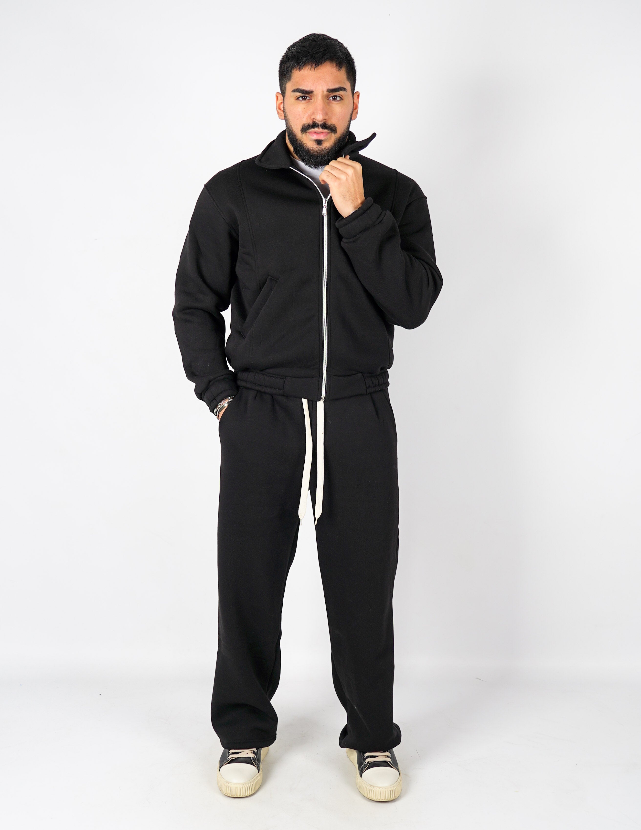 Tuta baggy con collo e zip