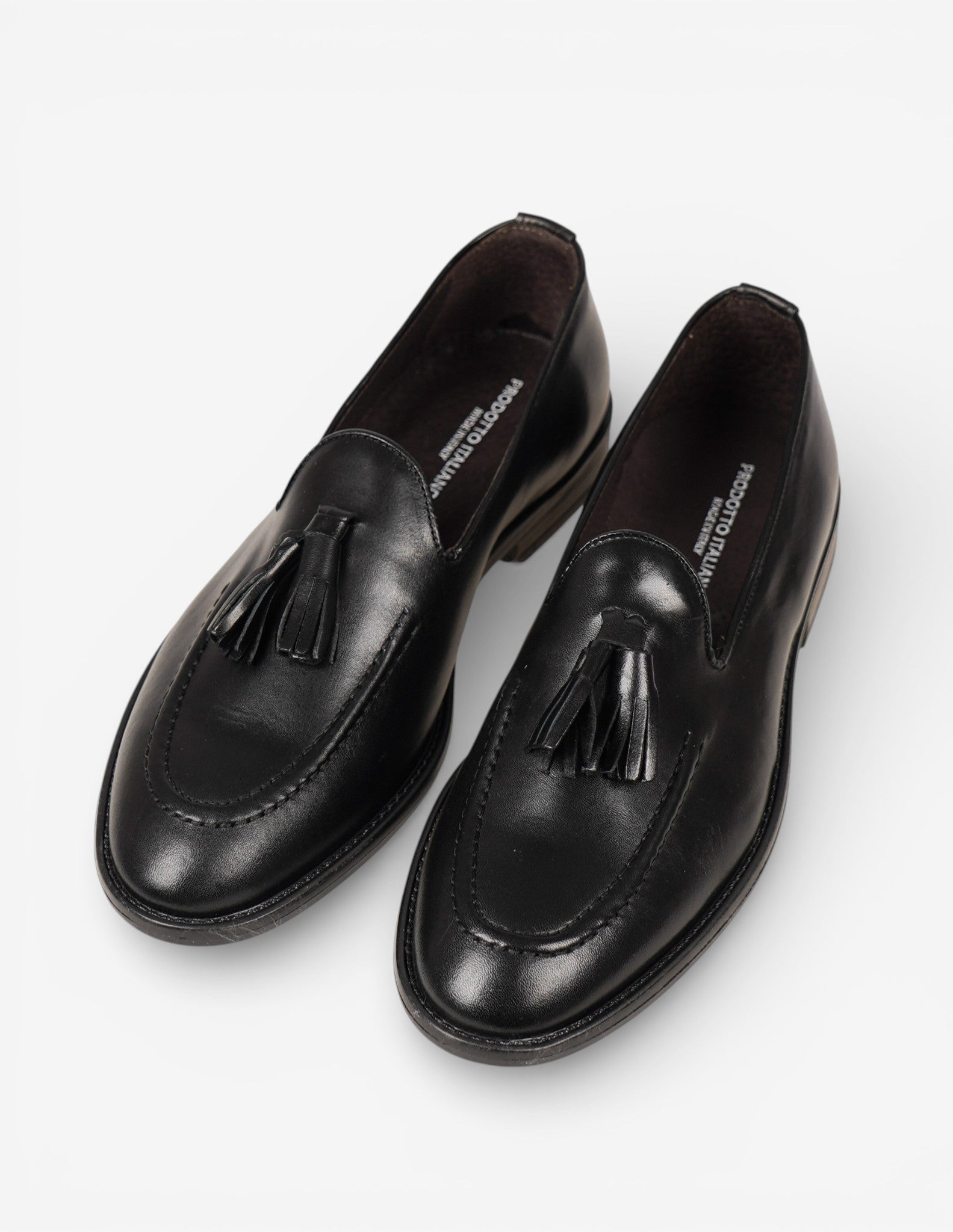 mocassino in pelle con nappine
