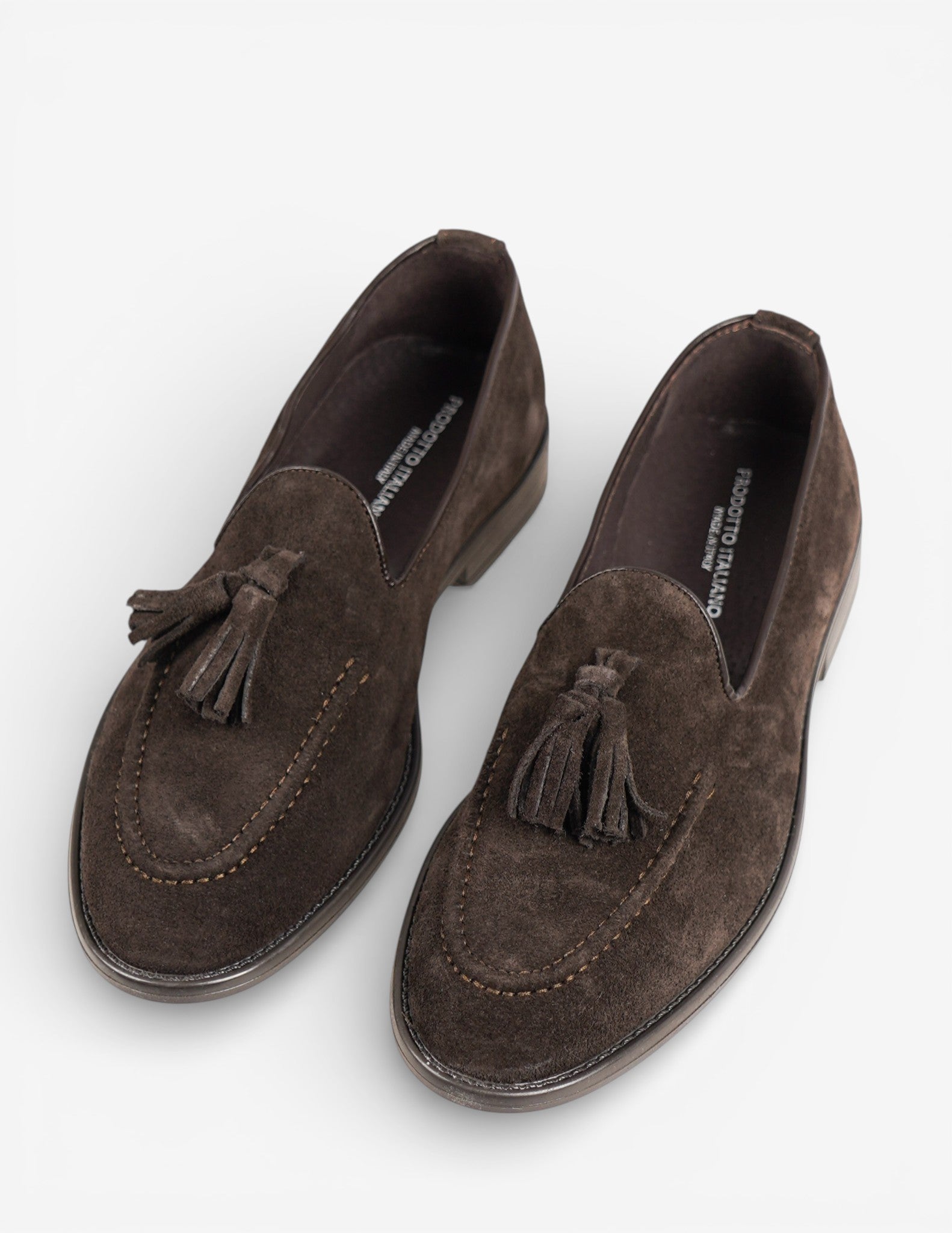 mocassino in camoscio con nappine