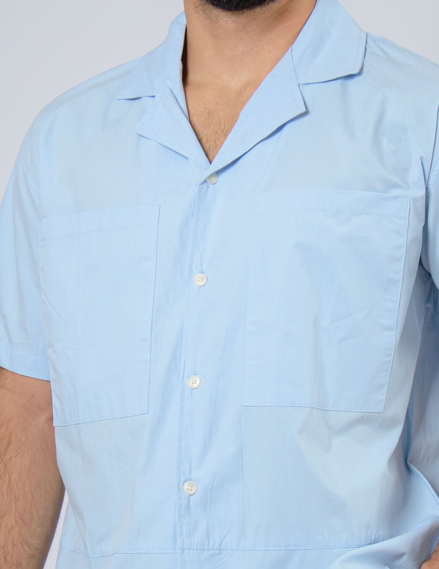 camicia manica corta con tasche anteriori