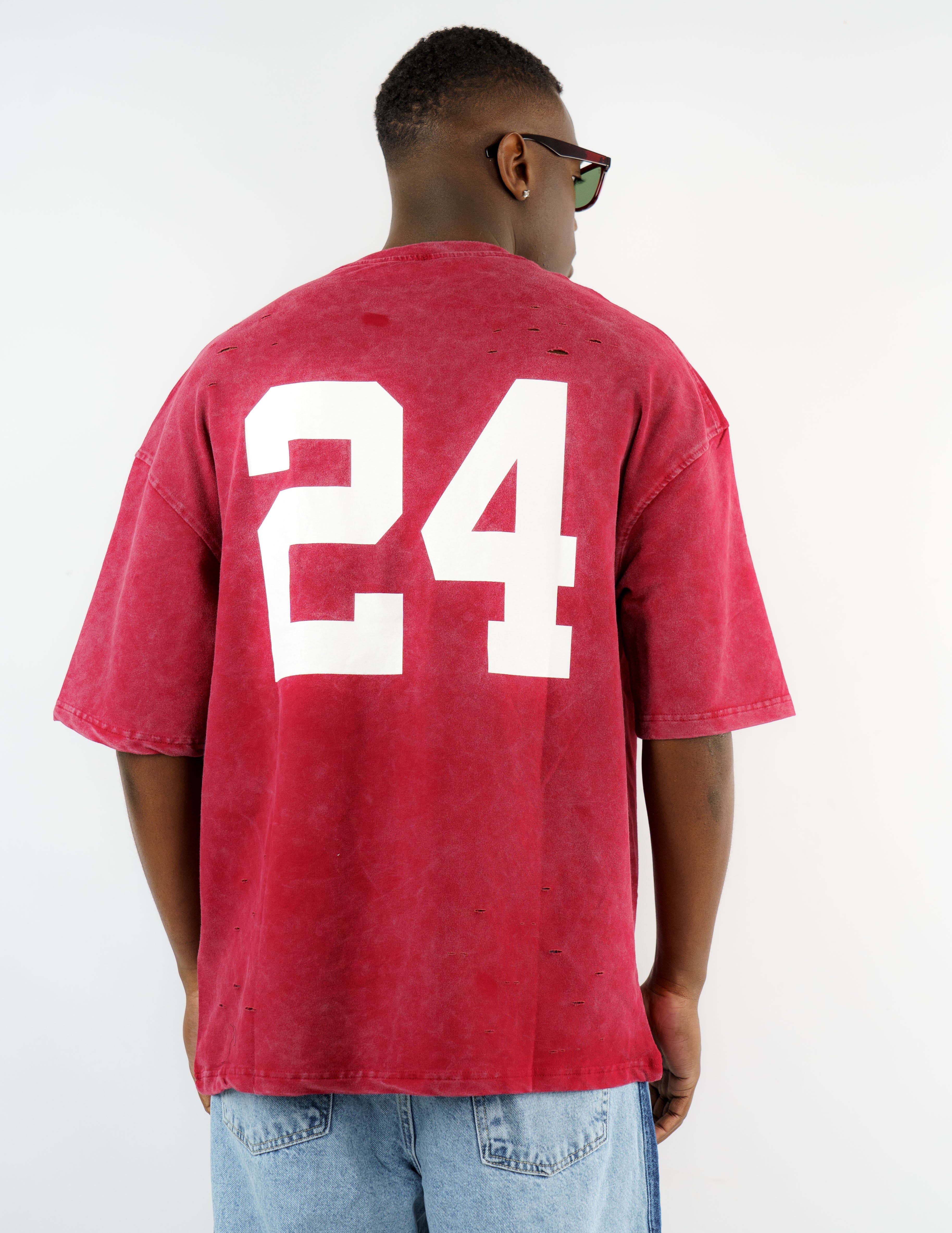 t-shirt slavata con stampa e rotture