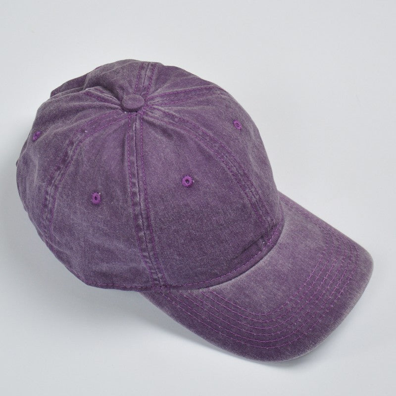 cappello con visiera slavato viola