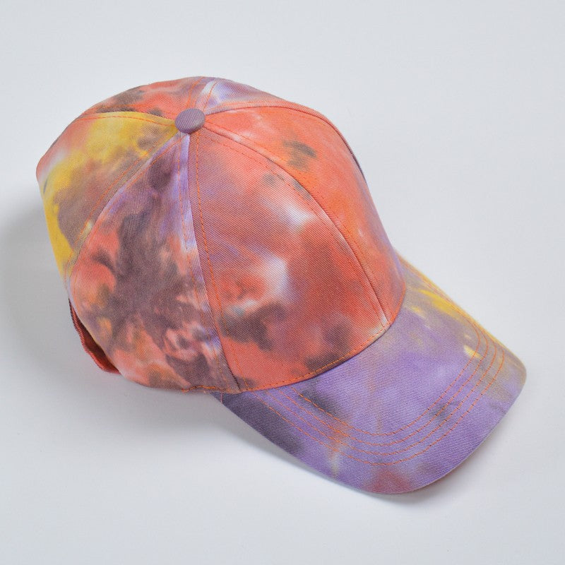 cappello con visiera effetto tye dye