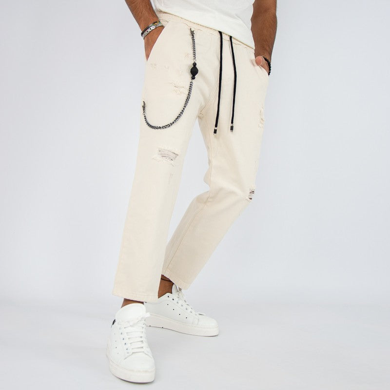 jeans jogger con elastico e rotture