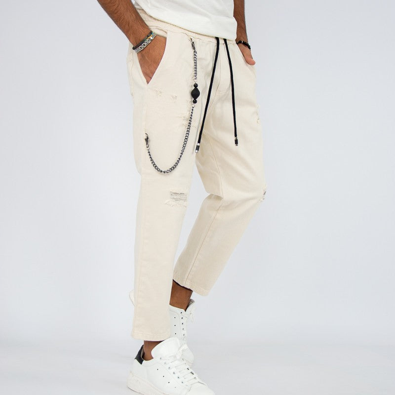 jeans jogger con elastico e rotture