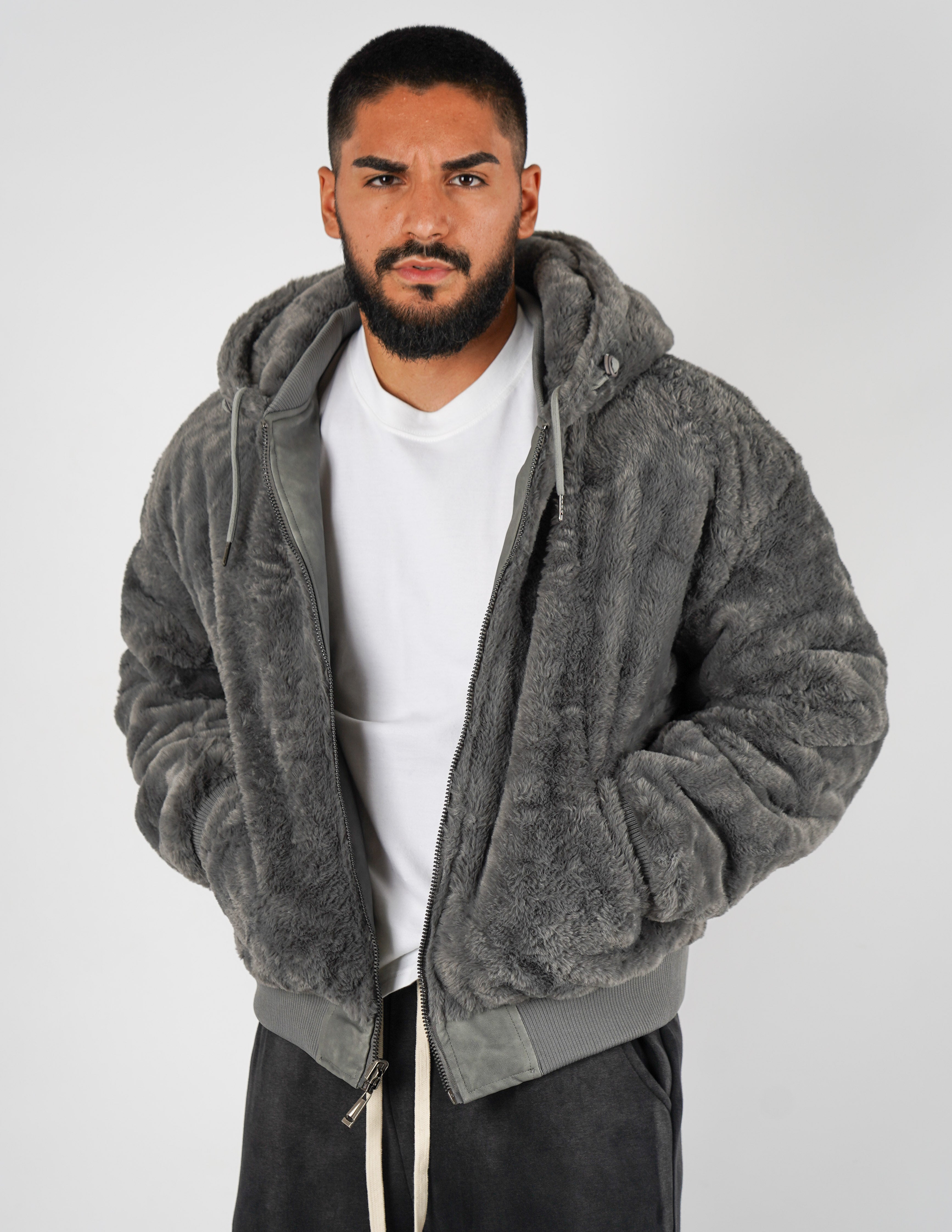 Pelliccia uomo reversibile con cappuccio