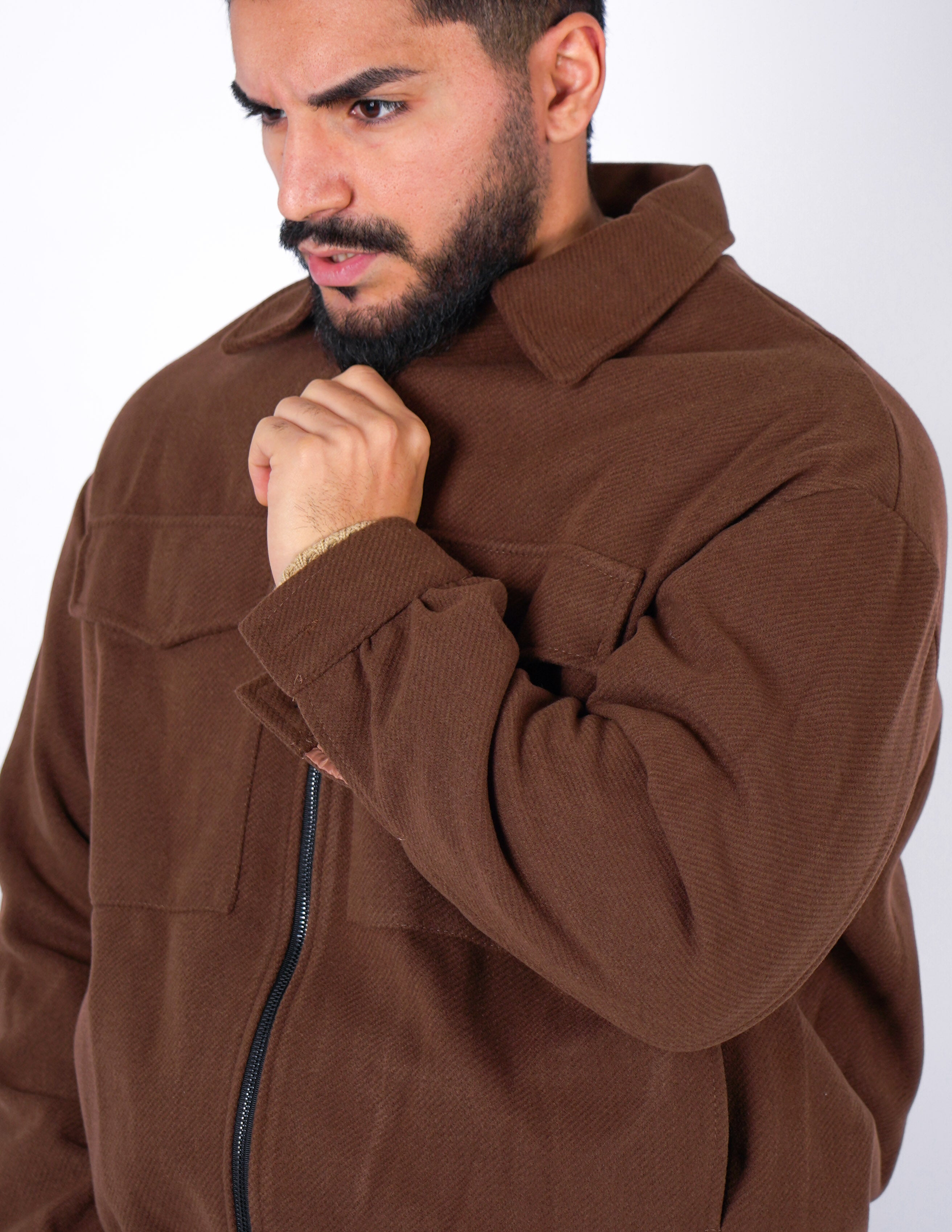 cappottino corto con tasche anteriori