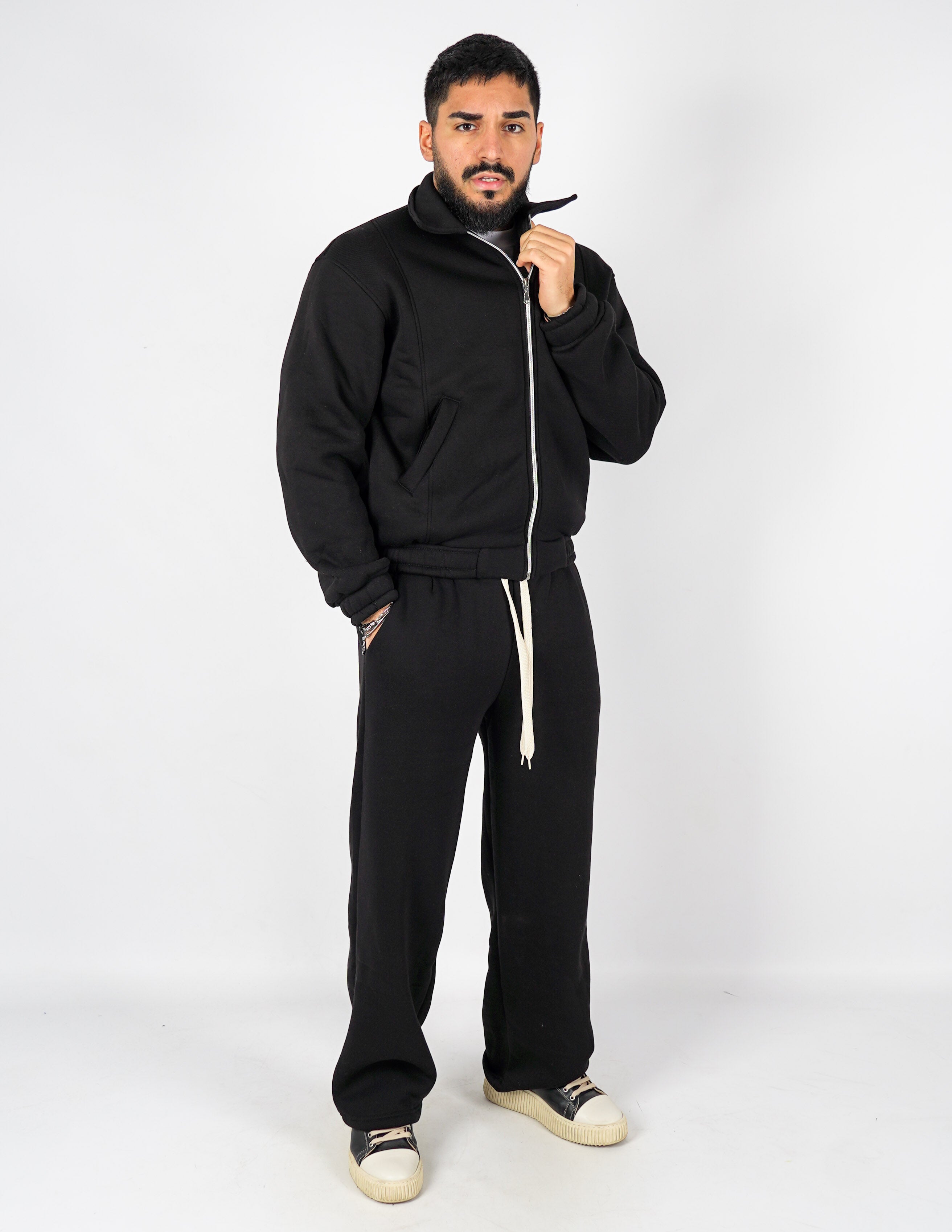 Tuta baggy con collo e zip