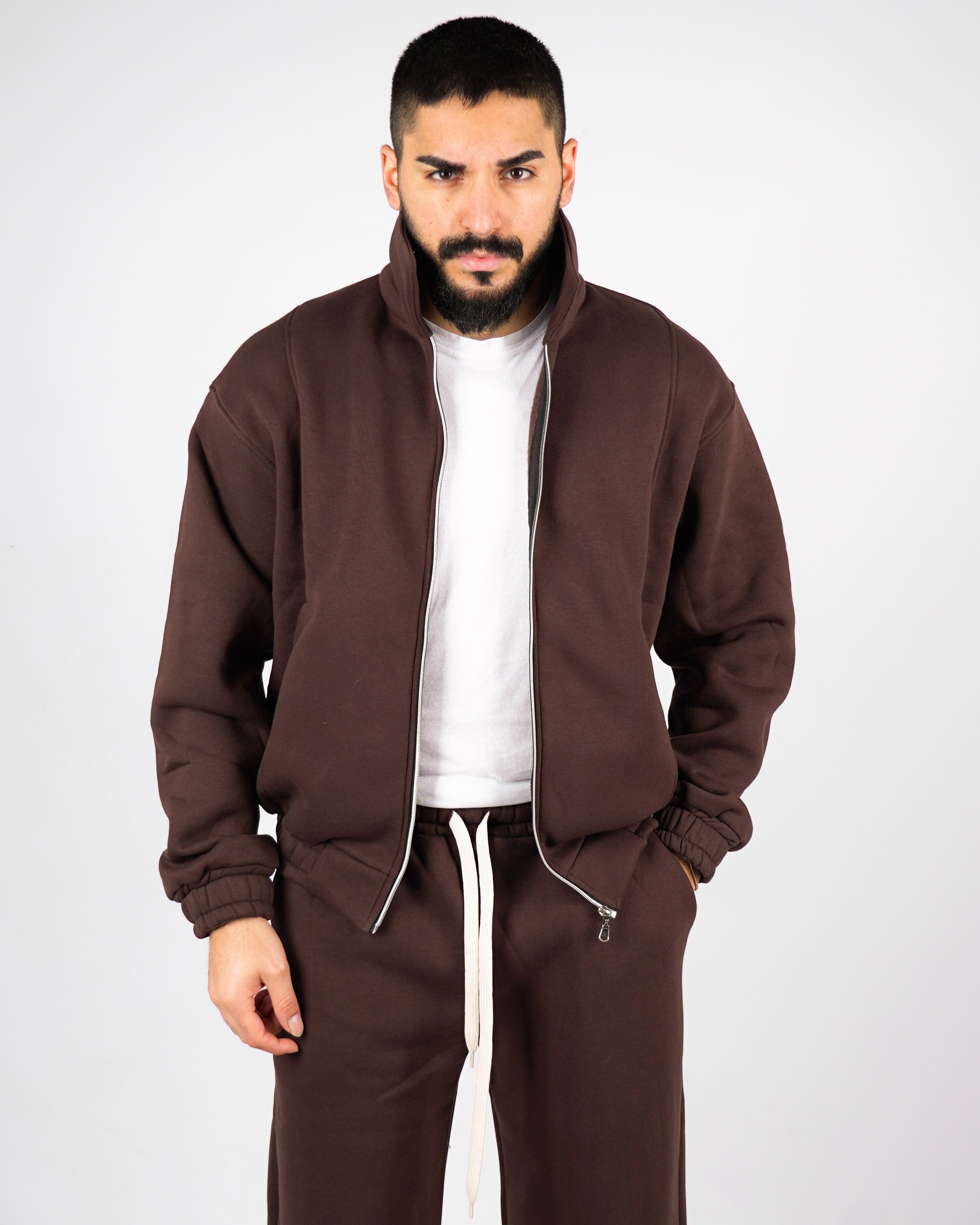 Tuta baggy con collo e zip