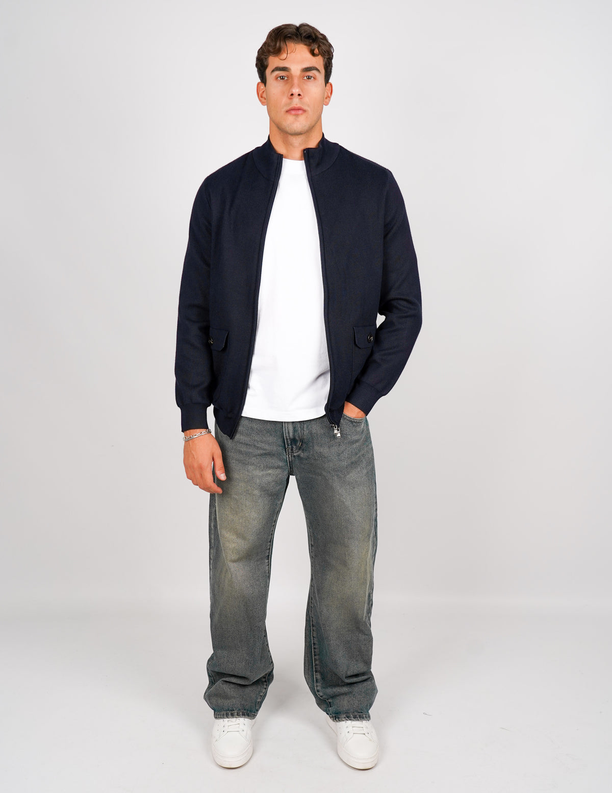 CARDIGAN CON ZIP E TASCHE