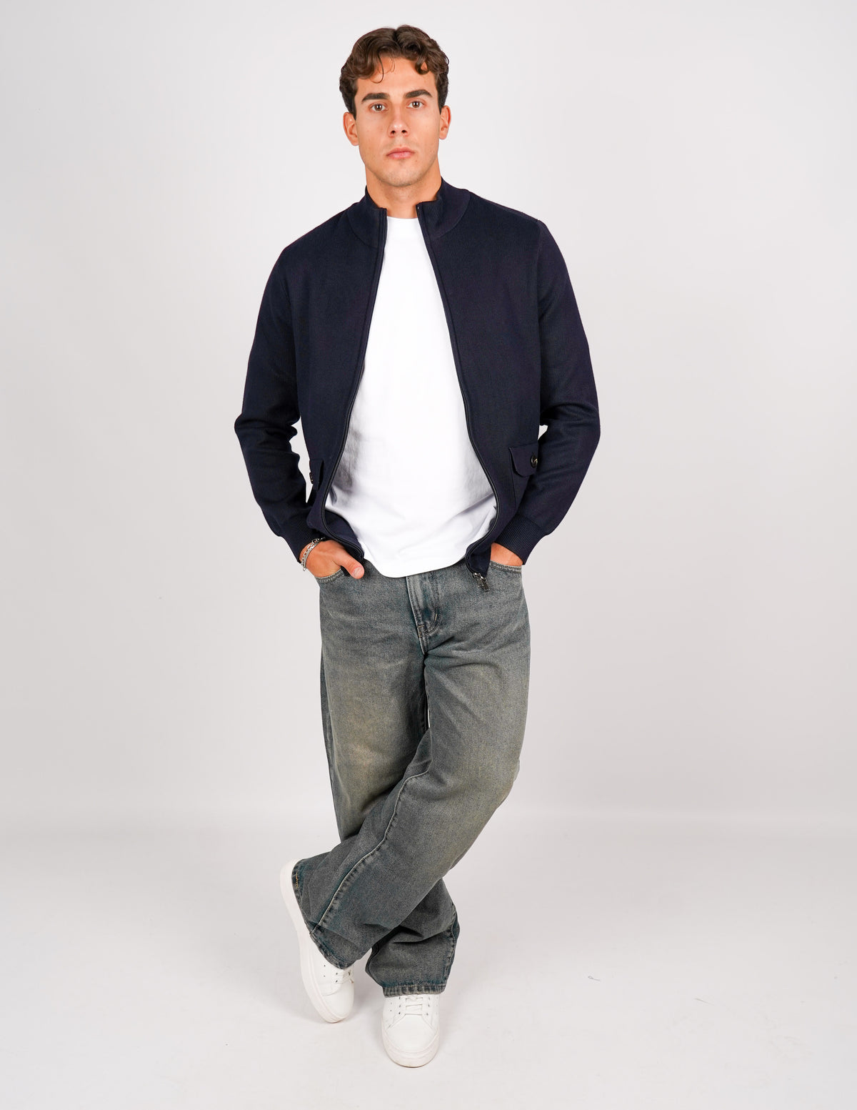 CARDIGAN CON ZIP E TASCHE
