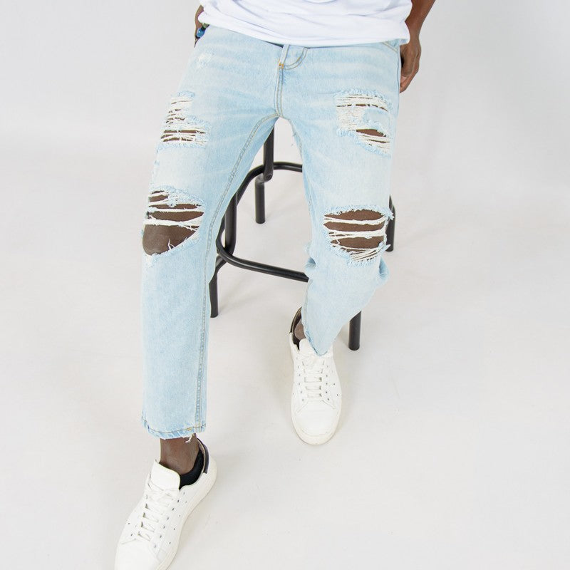 jeans uomo denim rotture chiaro